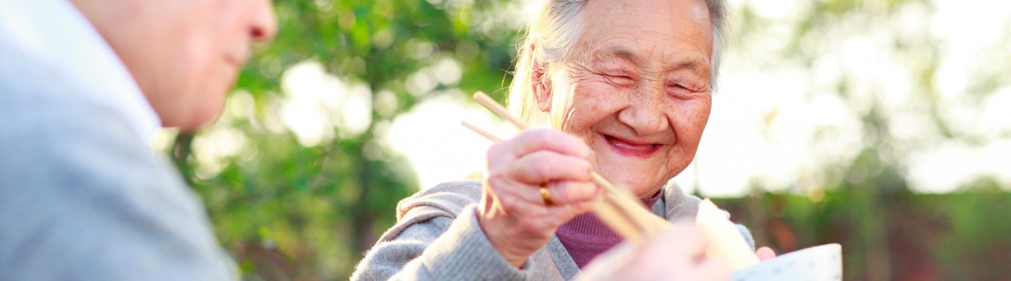 husband and wife sharing dinner