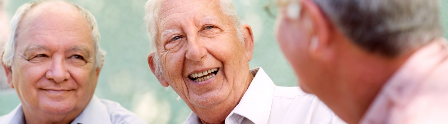 man talking with friends